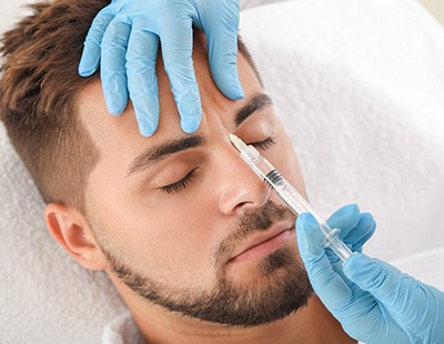 A man getting a BOTOX injection