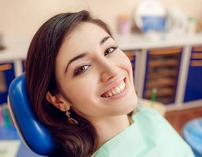 Woman smiling in dental chair