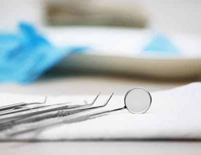 Dental tools on chairside tray