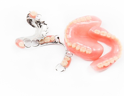 Different types of dentures in Ellicott City on white background