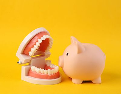 piggy bank and dentures
