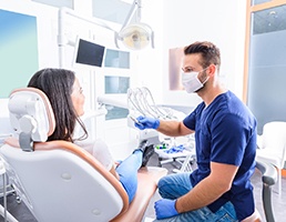 Woman at dentist in Ellicott City