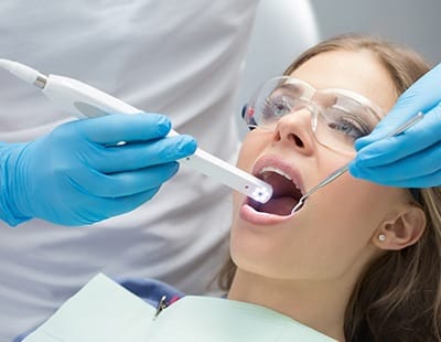 Dentist capturing intraoral images